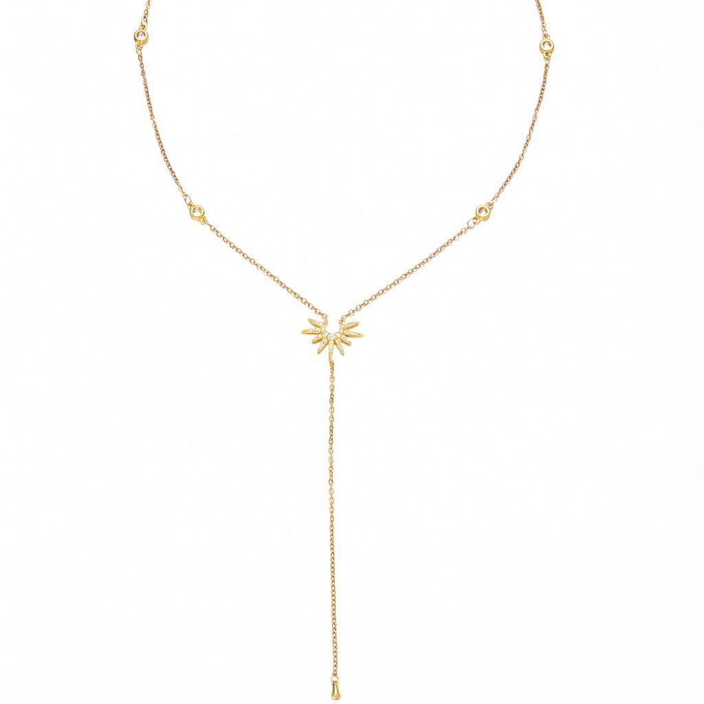18K gold Y-lasso necklace with diamond sunflower pendant.