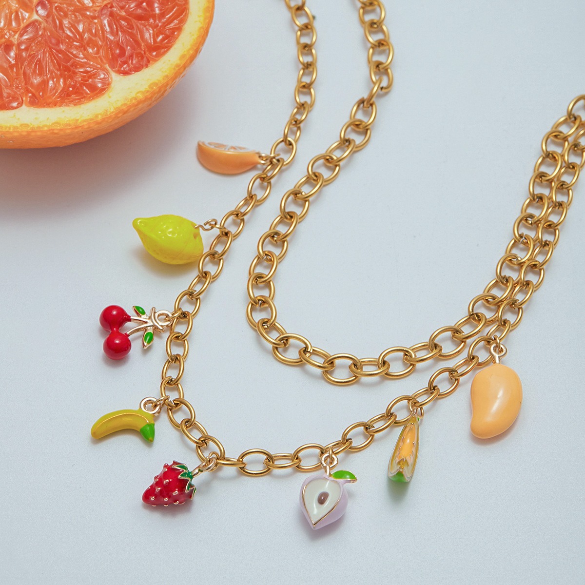 18K gold thick chain with fruit-shaped pendant design trendy and unique necklace, bracelet and earrings set