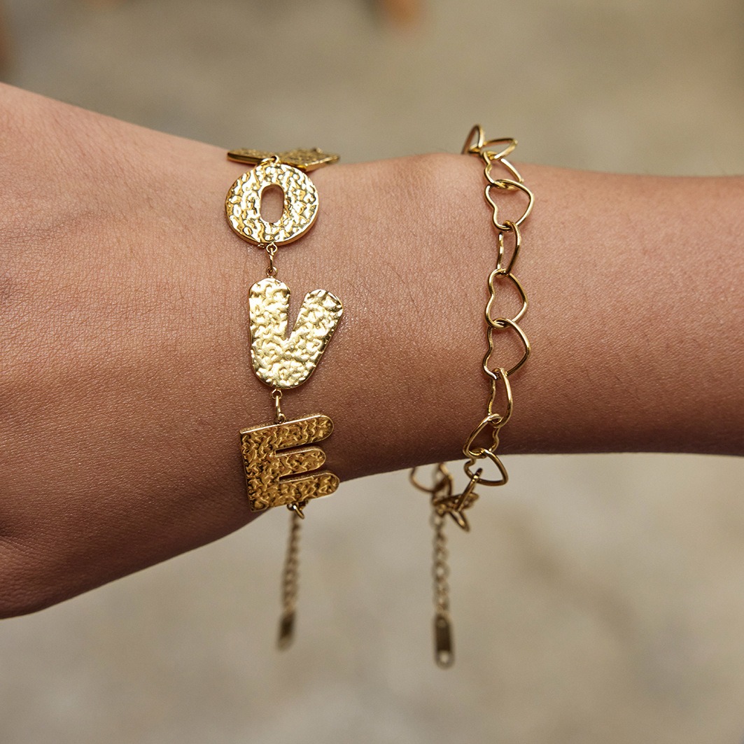 18K gold-plated, lightweight, and luxurious titanium steel bracelet with letter design. - Image 3