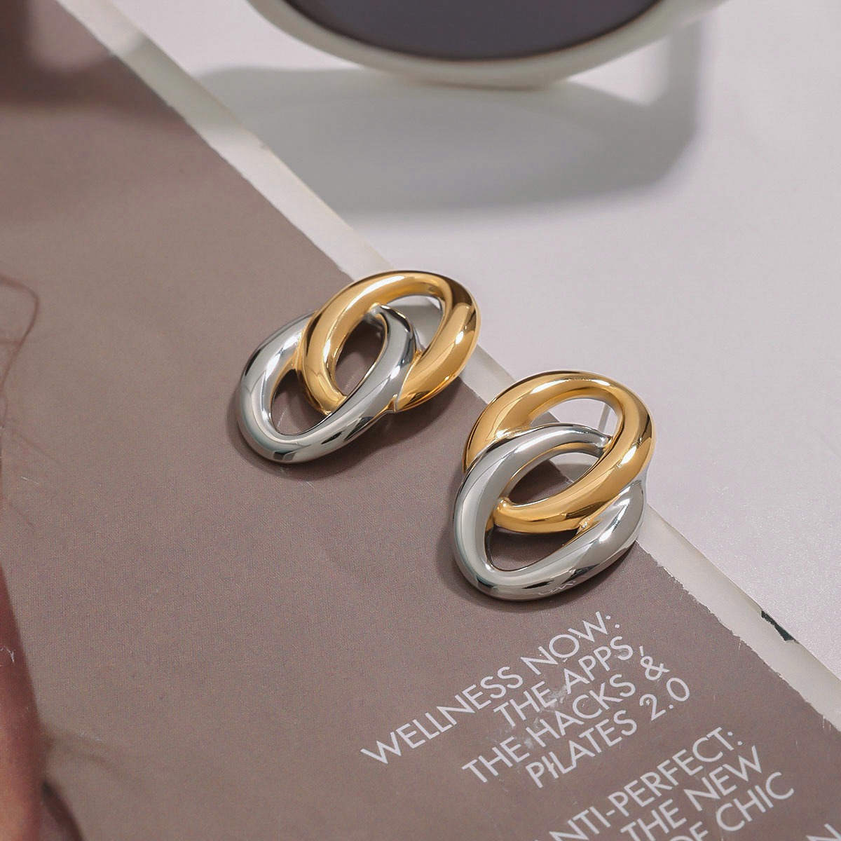 18K gold hollow oval earrings with gold and silver color matching design, simple and elegant - Image 5
