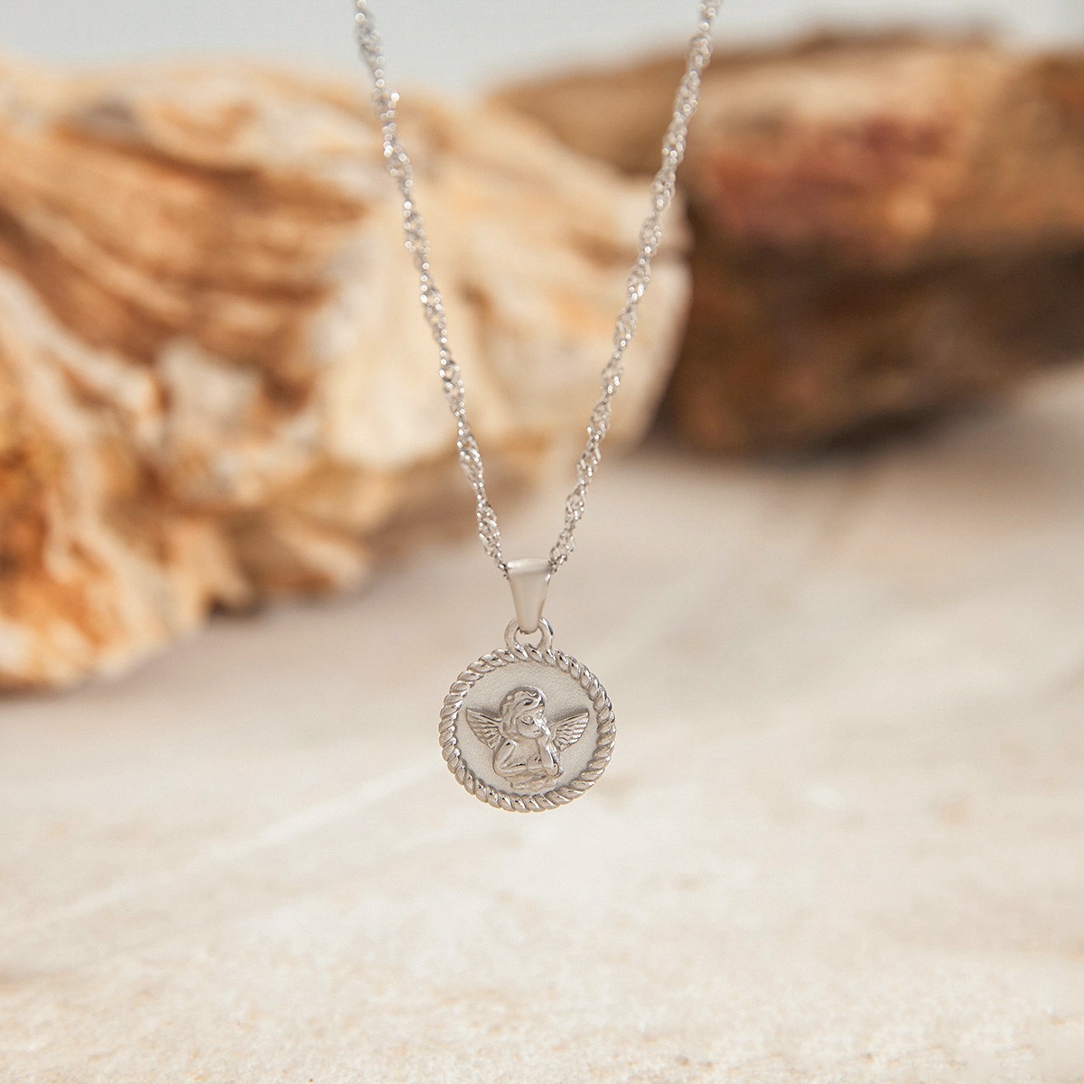 Round necklace with angel pattern design, classic and fashionable