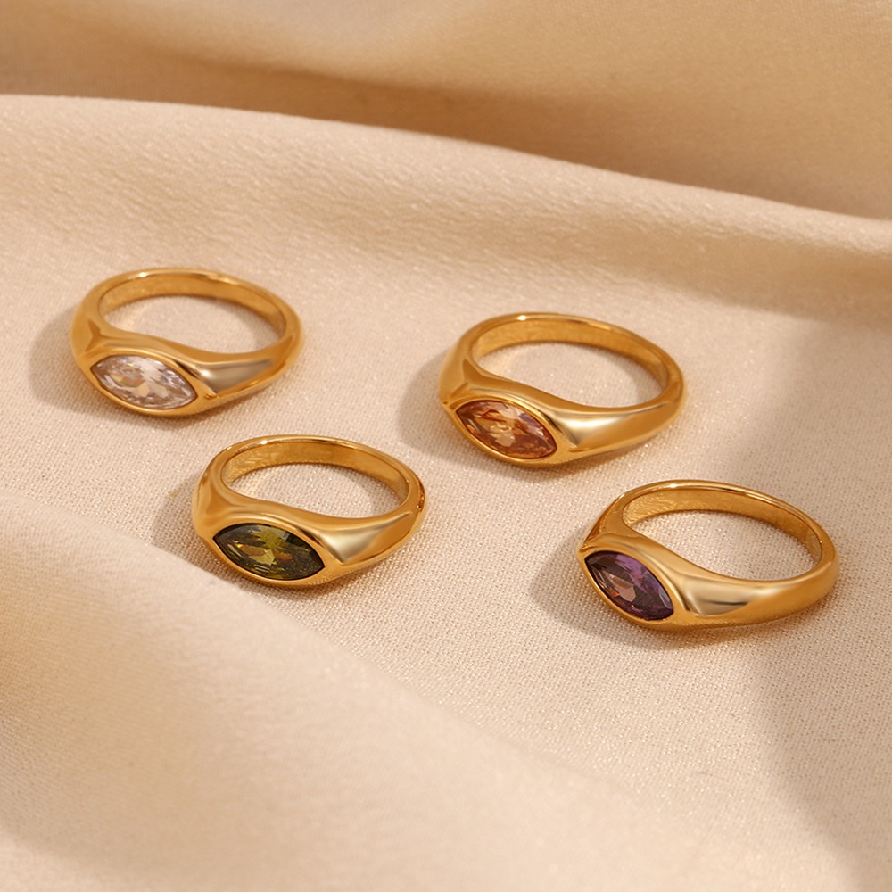 18K gold ring with marquise-cut zircon and seal design