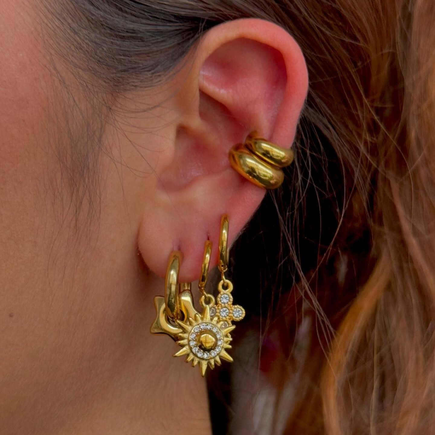 18k gold sun-shaped diamond-studded earrings with unique design - Image 6
