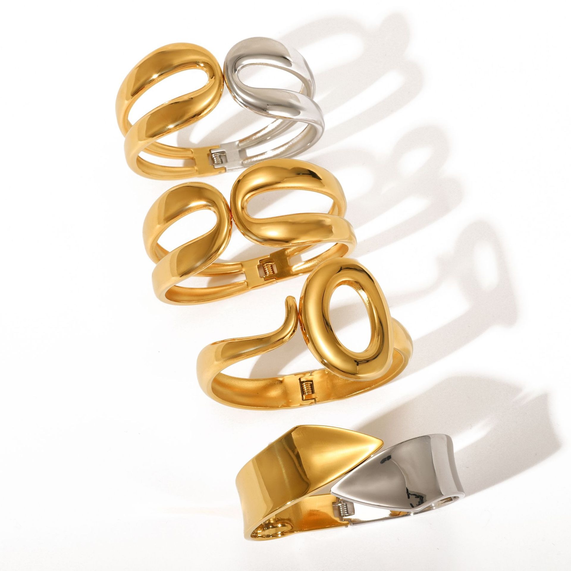 18k gold plated titanium steel bracelet with a spring clasp.